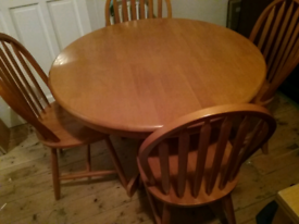 SOLID PINE ROUND TABLE AND 4 CHAIRS