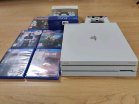 Ps4 pro white with 2 controllers and 5 games 