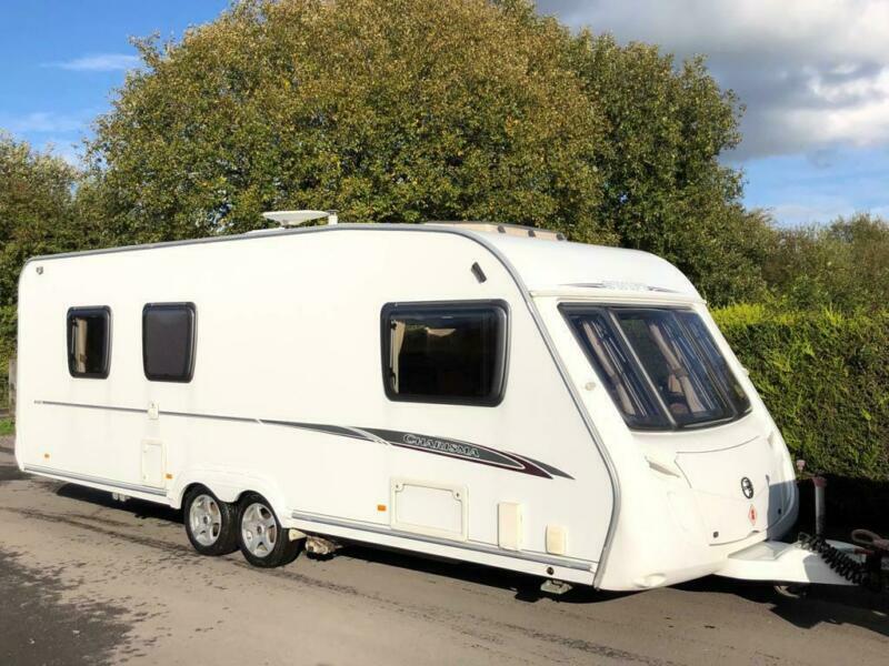 Swift Charisma Twin Axle Fixed Island Bed Caravan With Motor Mover