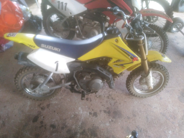 Suzuki 70 лодочный мотор