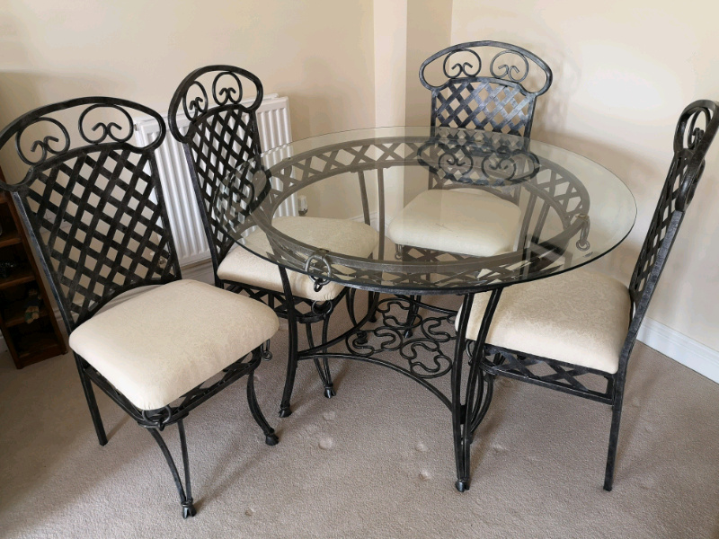 Italian style Glass top round dining table and 4 chairs in Bury St