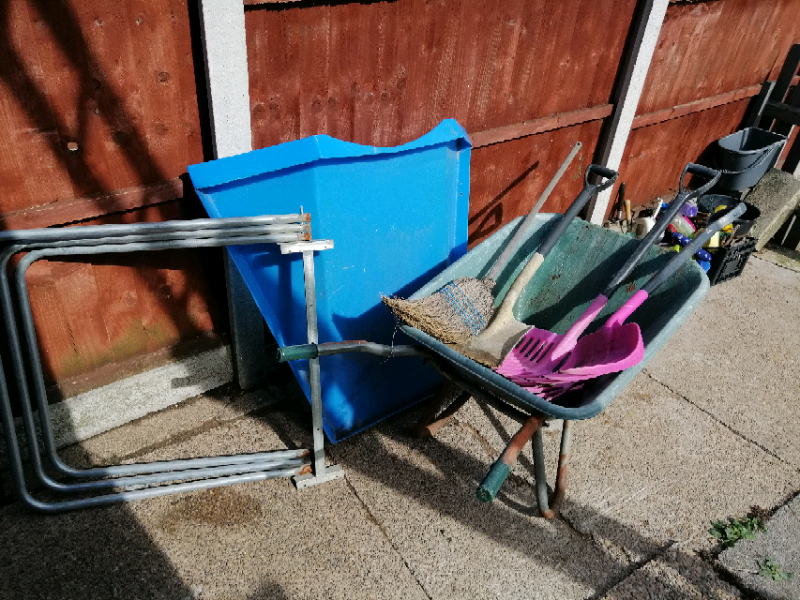 Stable and Mucking out tools Horses. Wheel barrow fork shovel. Hay bar