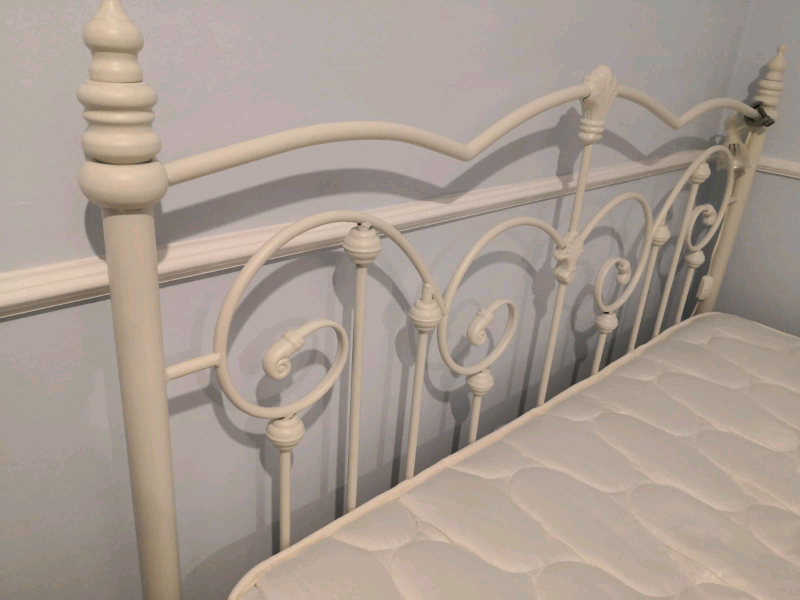 White metal Dunelm double bed frame and mattress. in Erith, London