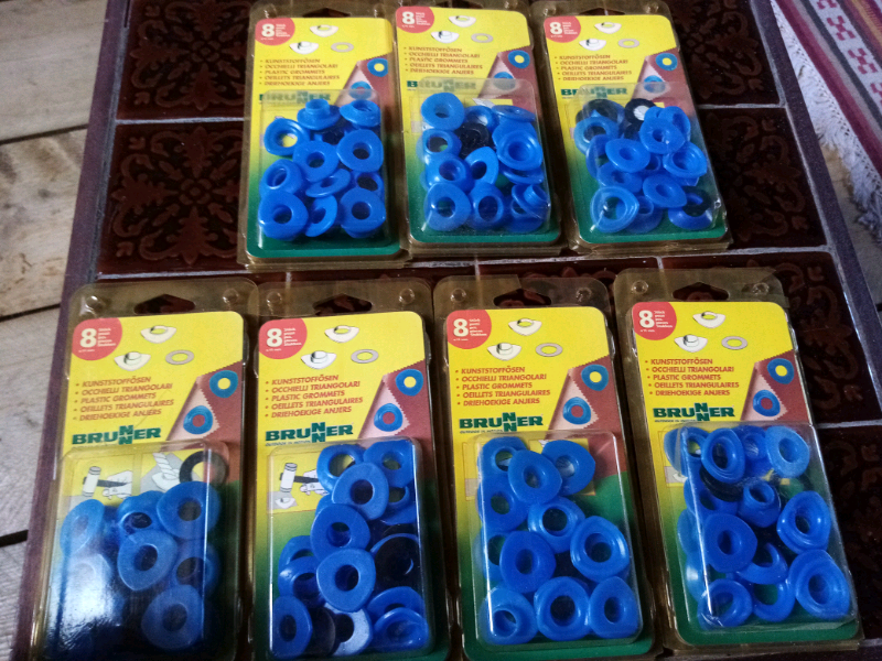56 plastic grommets as new for groundsheets car covers, tarpaulin etc