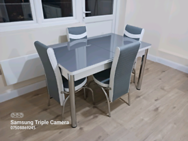Glass dining set extending with 4 6 leather chairs