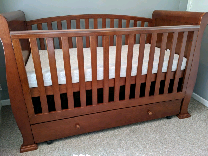 Cot Cotbed Sleigh style dark wood cot toddler bed and a day bed in