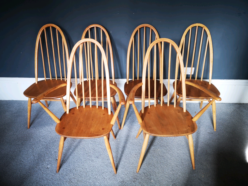 Six Mid Century ERCOL Quaker Carver Dining Chairs. Two with arms in