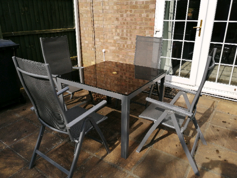 four seater patio table and chairs
