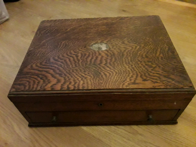 Canteen of cutlery. Wooden box with hinged lid and lower drae in
