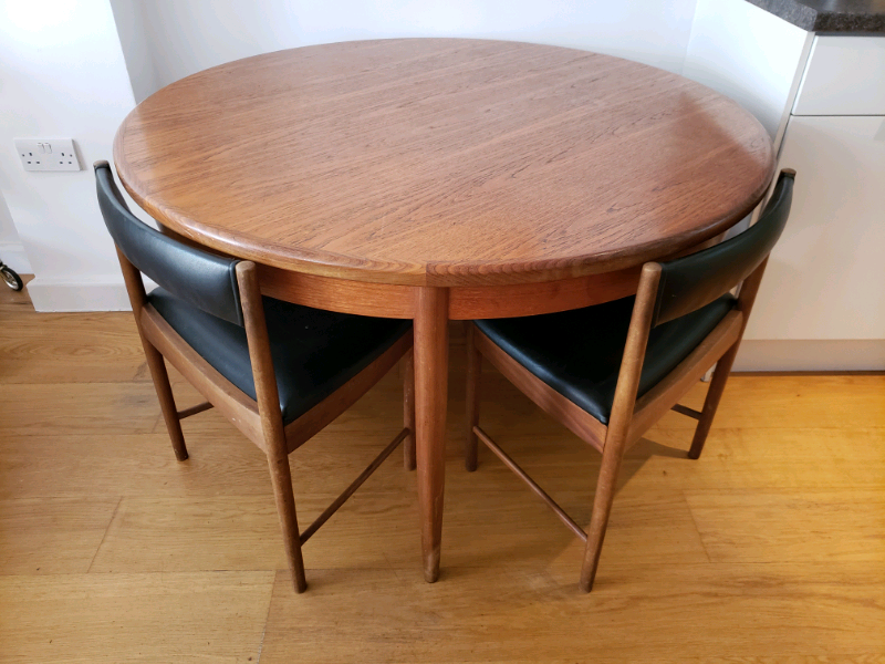 Vintage G Plan teak extending dining table with four tuck under chairs