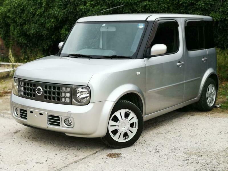 Nissan cube 2004 год