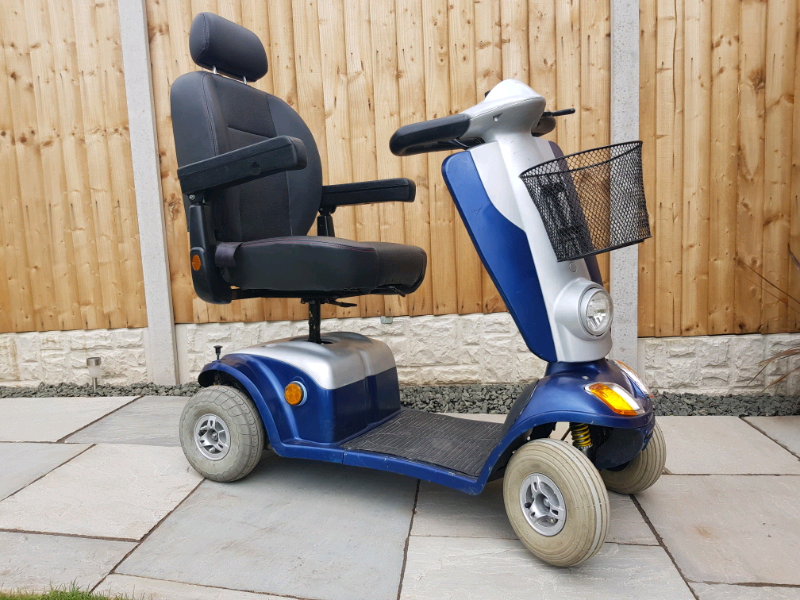 8mph kymco mobility scooter *Brand new batteries and charger* in