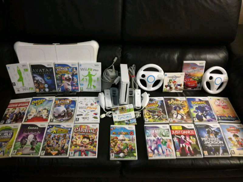 Nintendo Wii with Wii balance board 24 games and accessories in