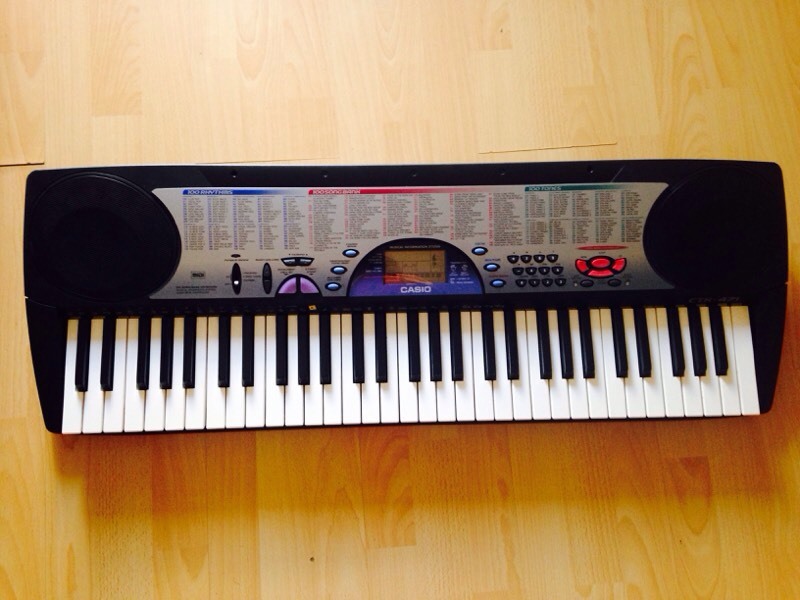Casio CTK471 keyboard with 100 song bank, tone and rhythm in