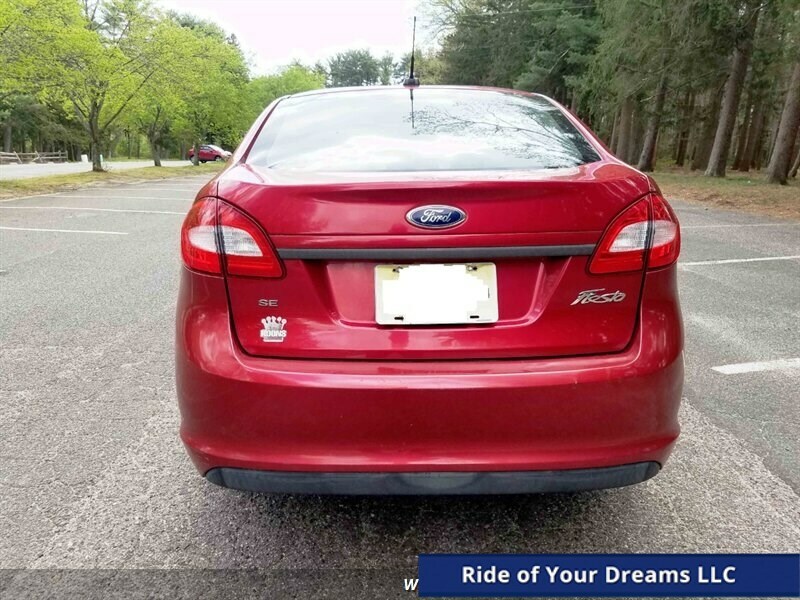Red Candy Metallic Tinted Clearcoat Ford Fiesta With 121,969 Miles