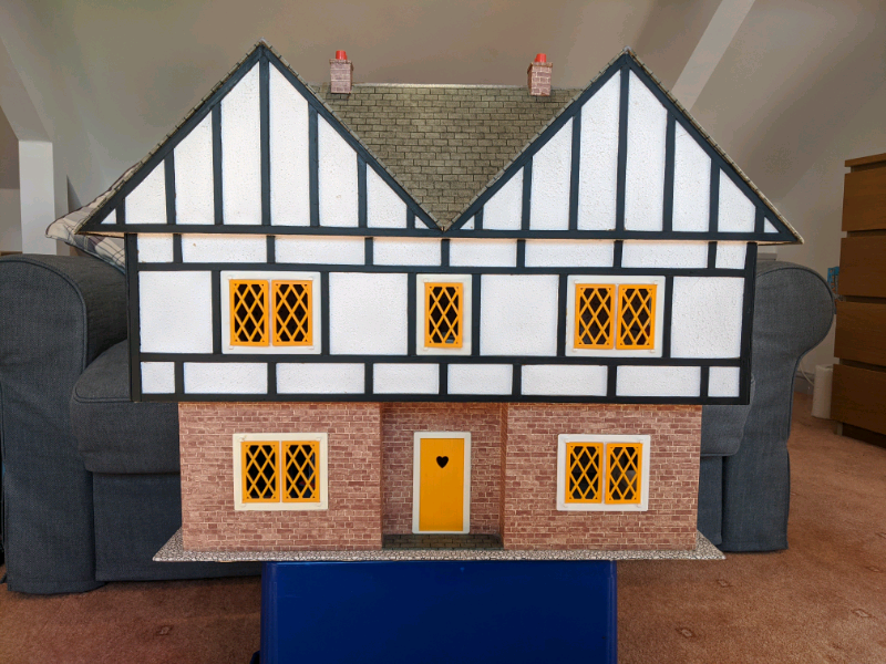 Tudor style handmade dolls house with furniture in Amble