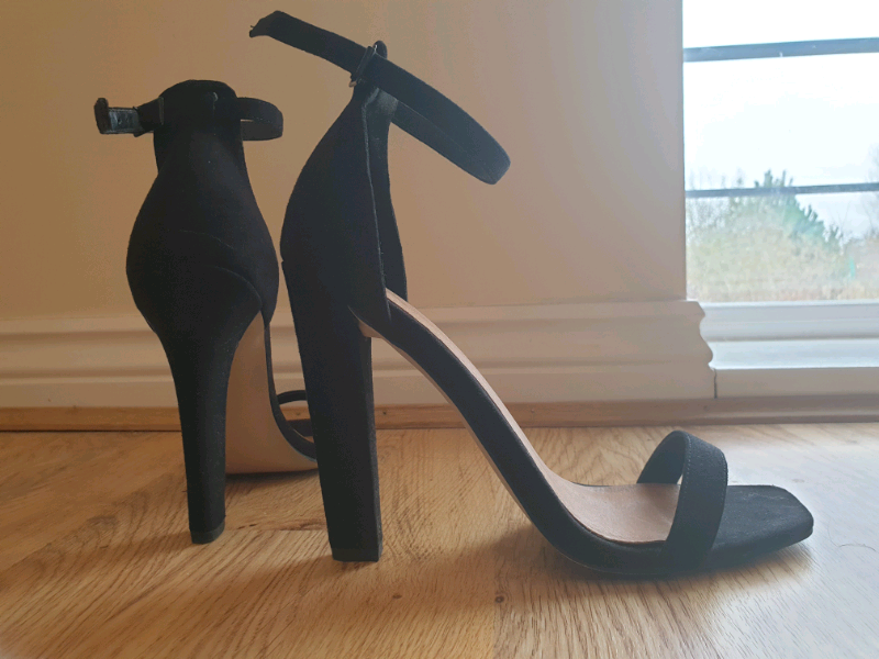 black high heel ankle strap shoes