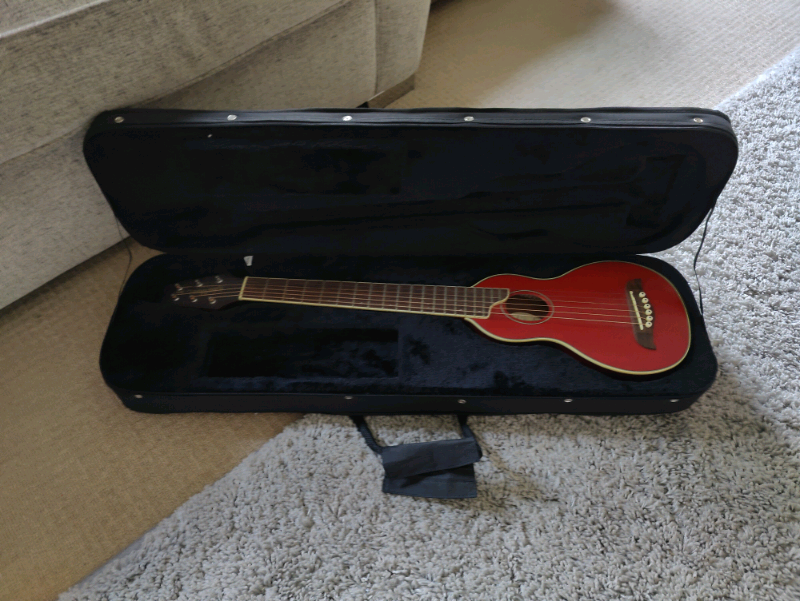 washburn rover travel guitar with case model number ( RO10TR ) in