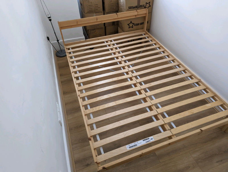Ikea Neiden Bed frame, pine with Standard Double Slatted bed base in