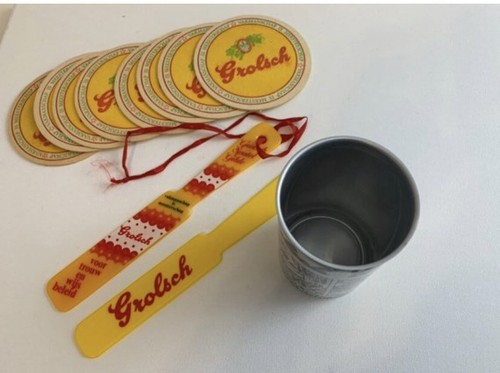 Vintage Grolsch Memorabilia: Beer Can, Yellow Plastic Spatel Glide, and Coasters