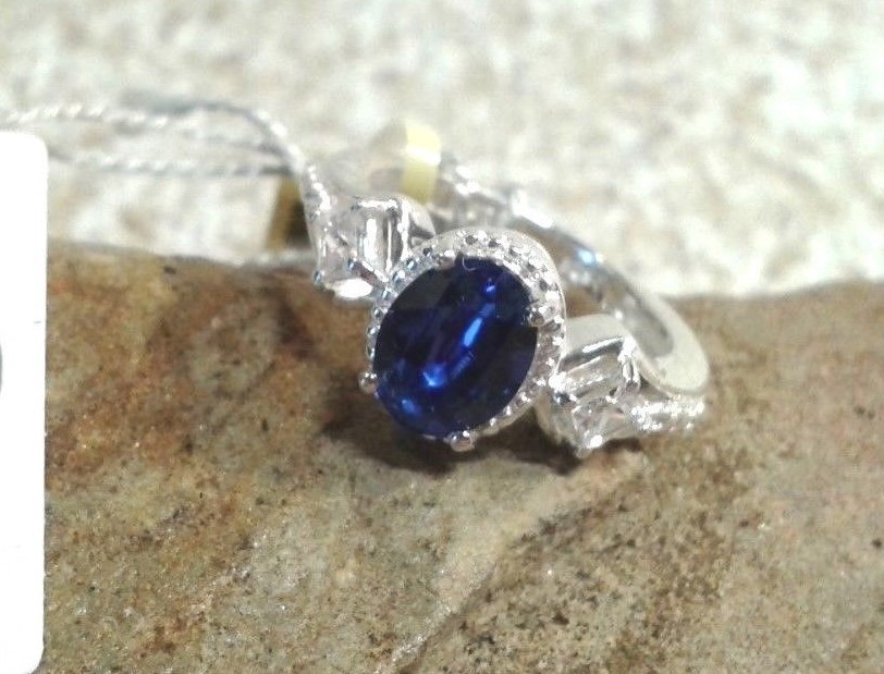 SIMULATED DIAMOND STERLING SILVER RING SIZE 5- MADE WITH SWAROVSKI BLUE CRYSTAL