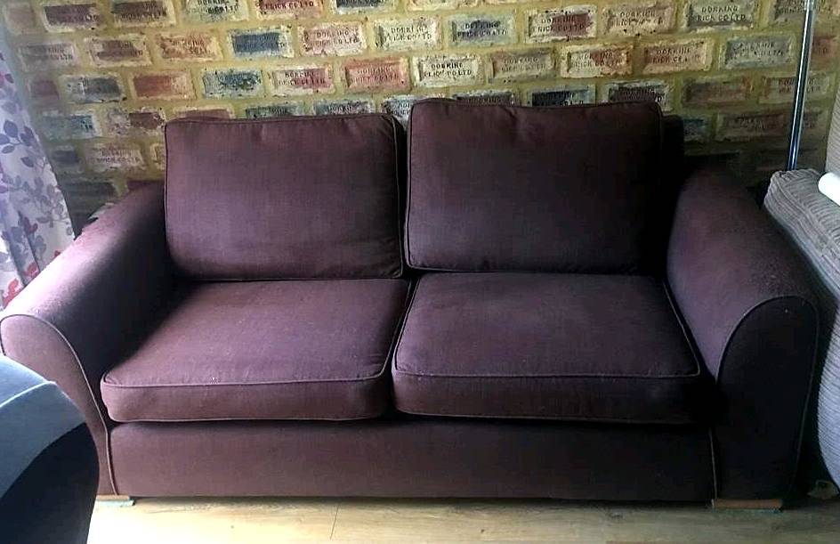 Brown large sofa bed. Excellent thick mattress in Dorking, Surrey