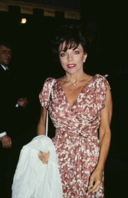 Joan Collins attends an event United States circa 1980s Old Photo 18