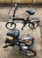 2 identical fold up bikes