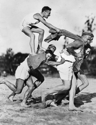 Members Sydney Life Saving Club enjoying a human chariot race duri- 1930s Photo