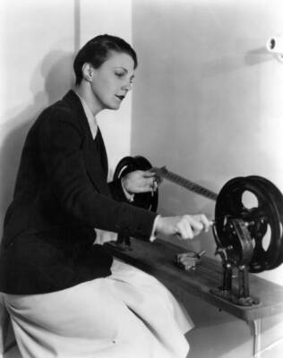 Leatrice Joy the Hollywood actress has a quick look at the rush- 1925 Old Photo