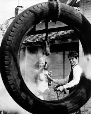 Warren Beatty as Clyde Barrow and Faye Dunaway as Bonnie Parker in- Old Photo 1
