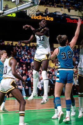 Patrick Ewing of Cambridge Rindge and Latin School awaits a reboun- Old Photo