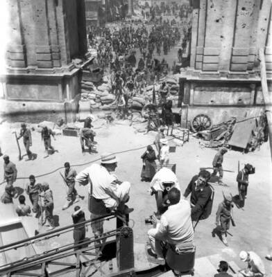 Italian director Luchino Visconti standing beside the camera and l- Old Photo