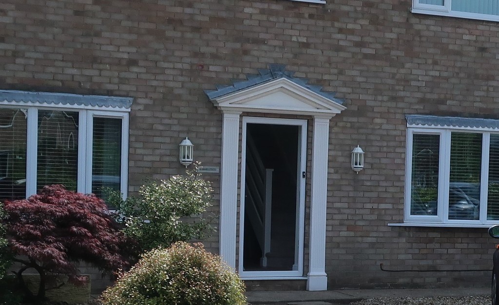 UPVC FLUTED DOOR SURROUND & APEX CANOPY in Lincoln, Lincolnshire