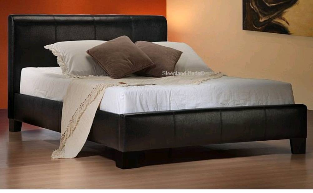 Black leather double bed with mattress in Pudsey, West Yorkshire