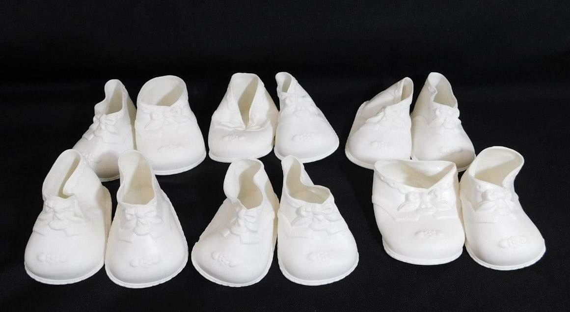 6 Pairs of Vintage White High Top Baby Doll Shoes