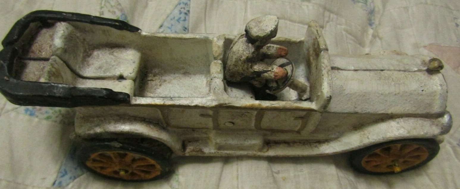 VINTAGE CAST IRON CAR WITH DRIVER ANTIQUE TOY MADE TO LAST