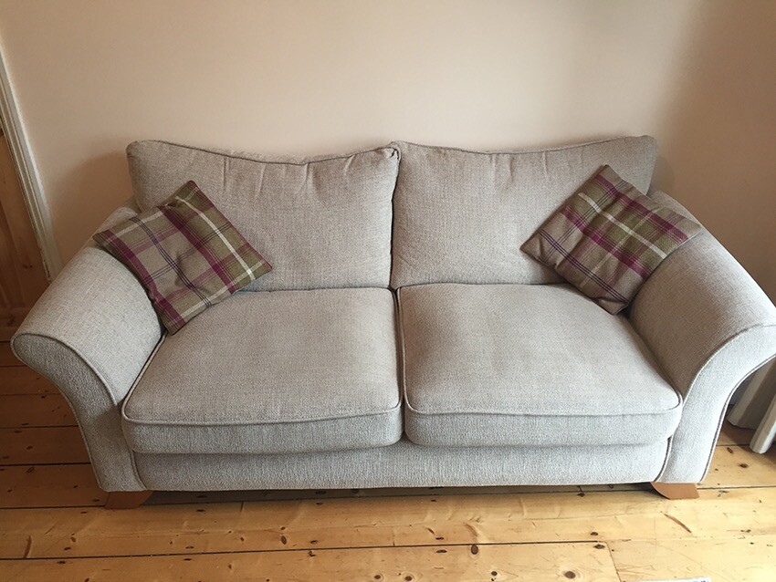 2x Oak Furnitureland 2 Seater High Back Sofas with Tartan Scatter