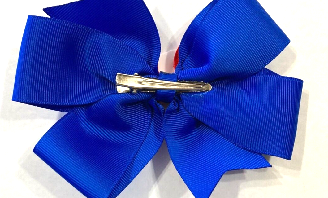 Beautiful M&M Candy inspired hair bow for girls.