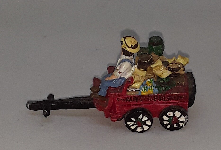 Painted Cast Metal Man on Wagon 95' IRS