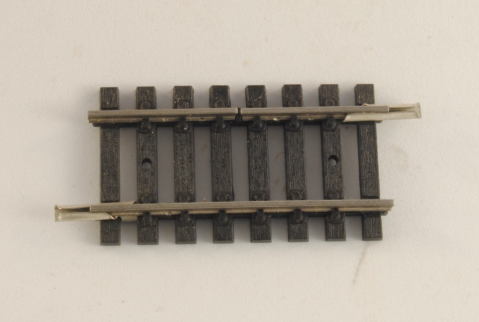 Lima N3022/A quarto di binario dritto 5,5 cm con interruzione unipolare H0 1:87