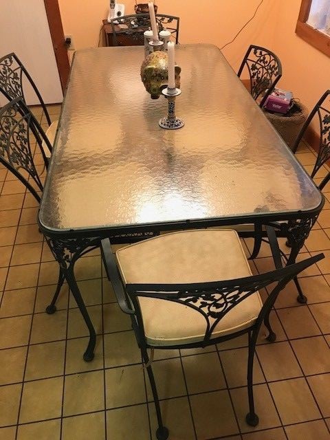 Beautiful Woodard wrought iron table and 6 chairs