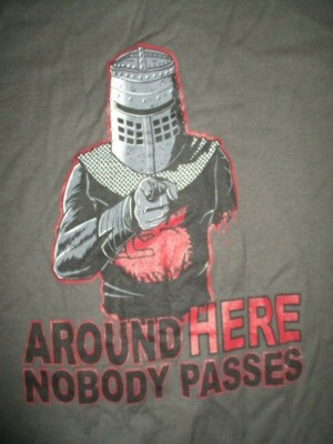 MONTY PYTHON and THE HOLY GRAIL ''Around Here Nobody Passes'' (XL) T-Shirt