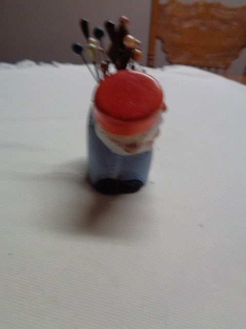 VINTAGE PORCELAIN BENDING GIRL PIN CUSHION MADE IN JAPAN IN GOOD CONDITION