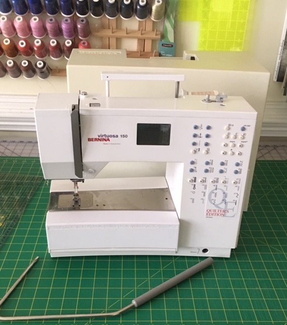 Bernina Virtuosa 150QE Quilters Edition sewing machine with extension table