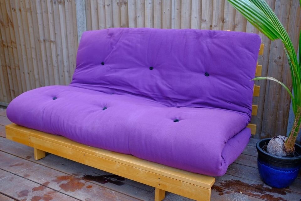 Purple futon (Futon company). Solid rubber base. in Haringey, London