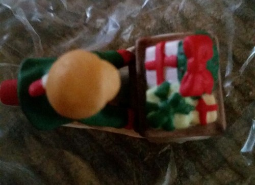 Colonial Village Figure Miniature by Lefton Boy Riding Bike With Packages