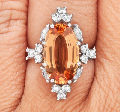 Imperial Oval Yellowish Orange 5.87CT Topaz With Shiny White CZ Cluster Ring