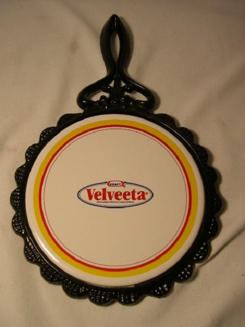 VELVEETA  CAST IRON  TRIVET