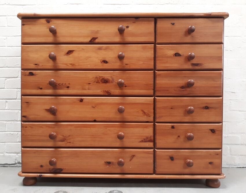 Pine chest of twelve bedroom drawers on bun feet in Southampton